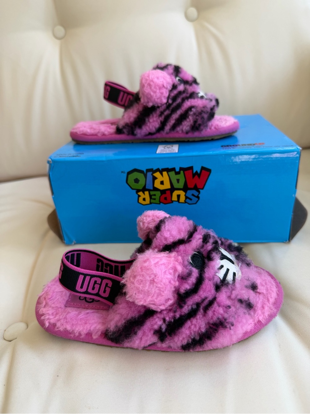 UGG Pink and Black Fuzzy Slide Slippers